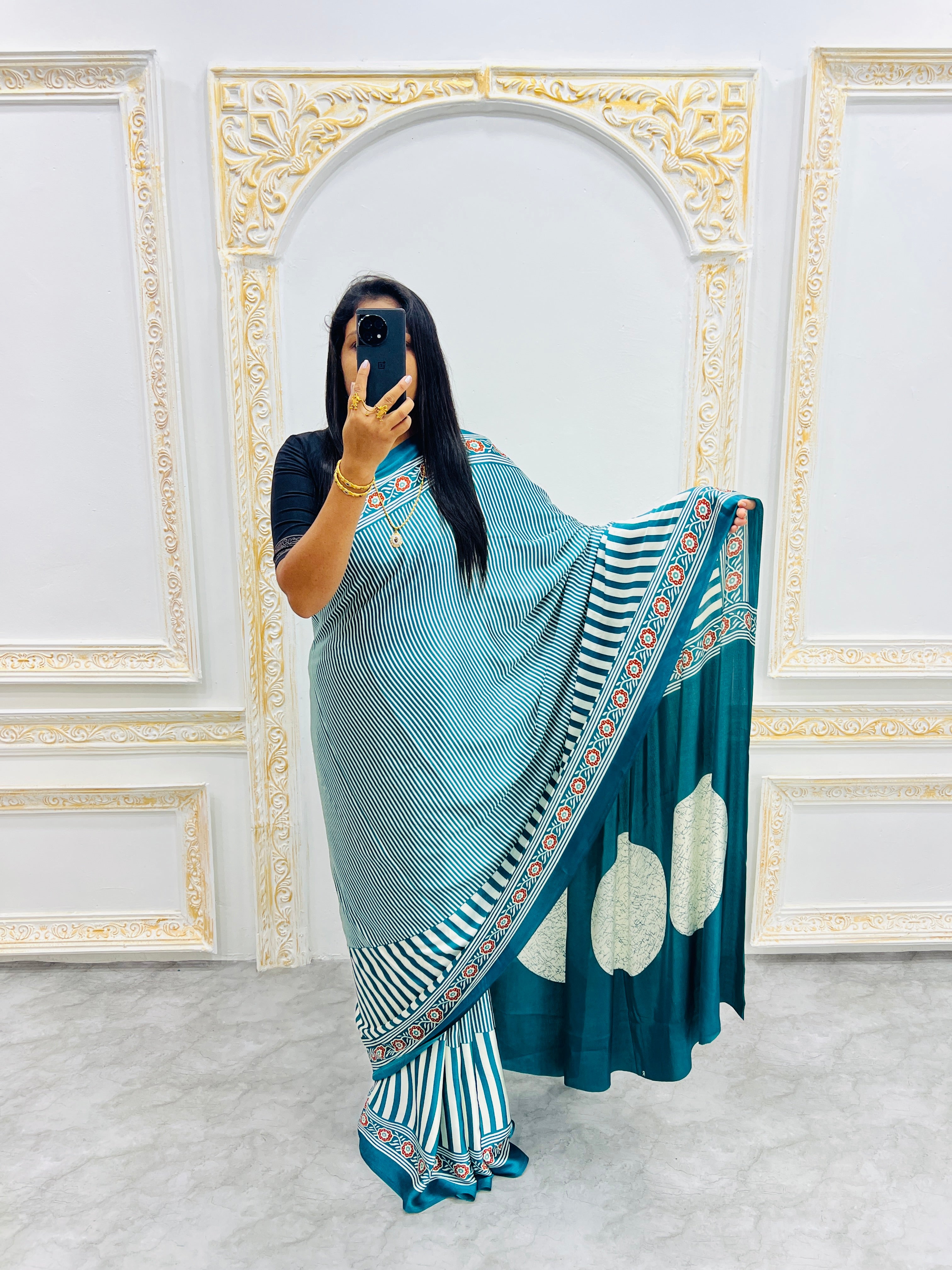 Teal Blue Designer Saree with Stripes and Bold Circular Print Border