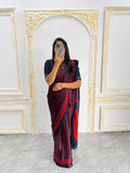 Black & Maroon Saree with Bold Red Circle Pallu – Modern Designer Look