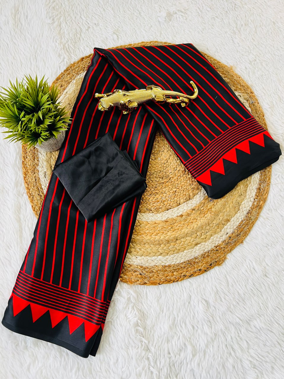 Black & Maroon Saree with Bold Red Circle Pallu – Modern Designer Look