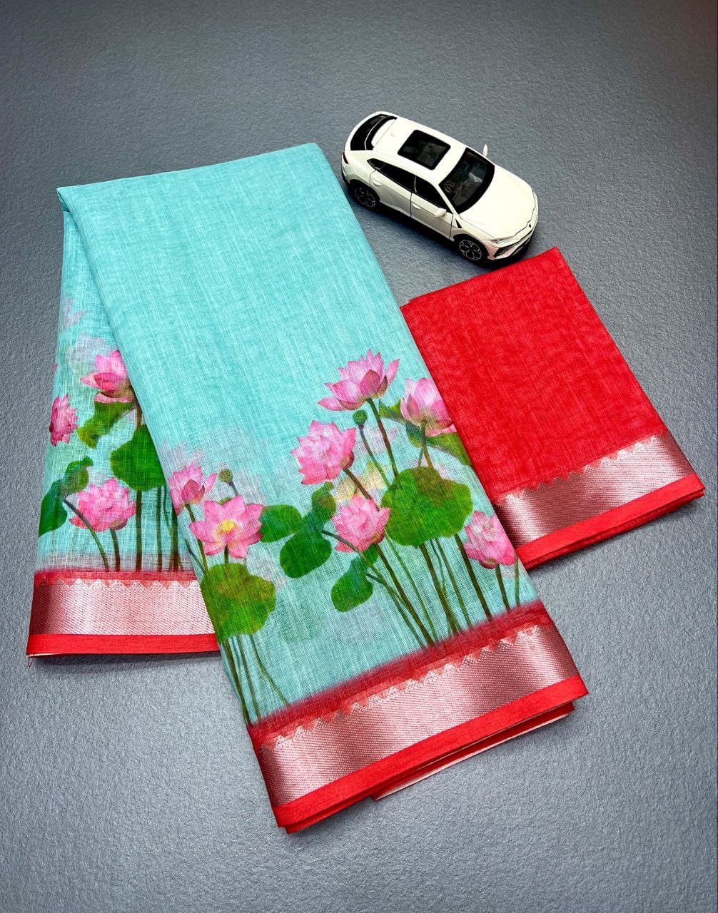 Aqua Linen Saree with Beautiful Lotus Print & Red Contrast Blouse