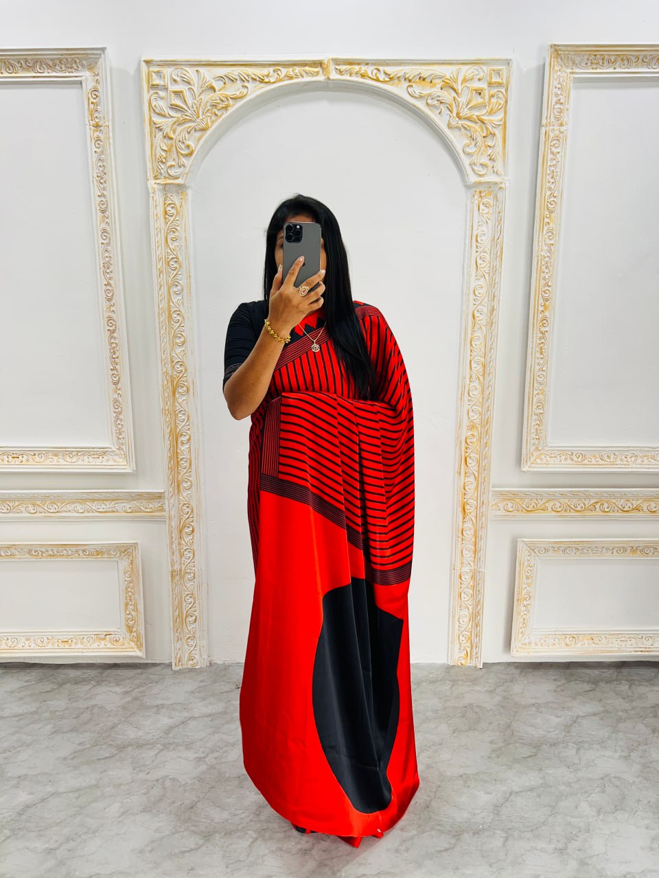 Red & Black Saree with Bold Red Circle Pallu – Modern Designer Look