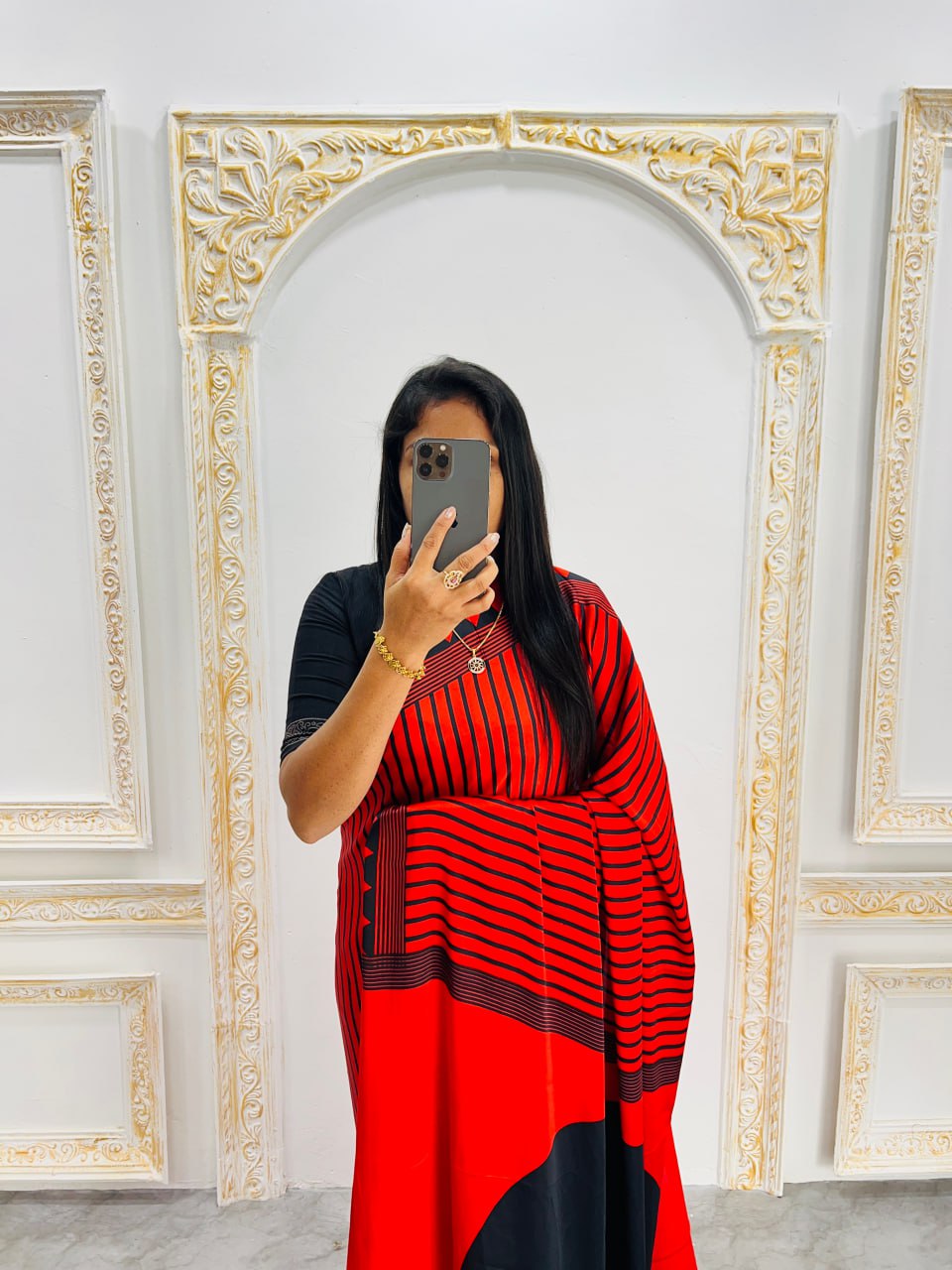 Red & Black Saree with Bold Red Circle Pallu – Modern Designer Look