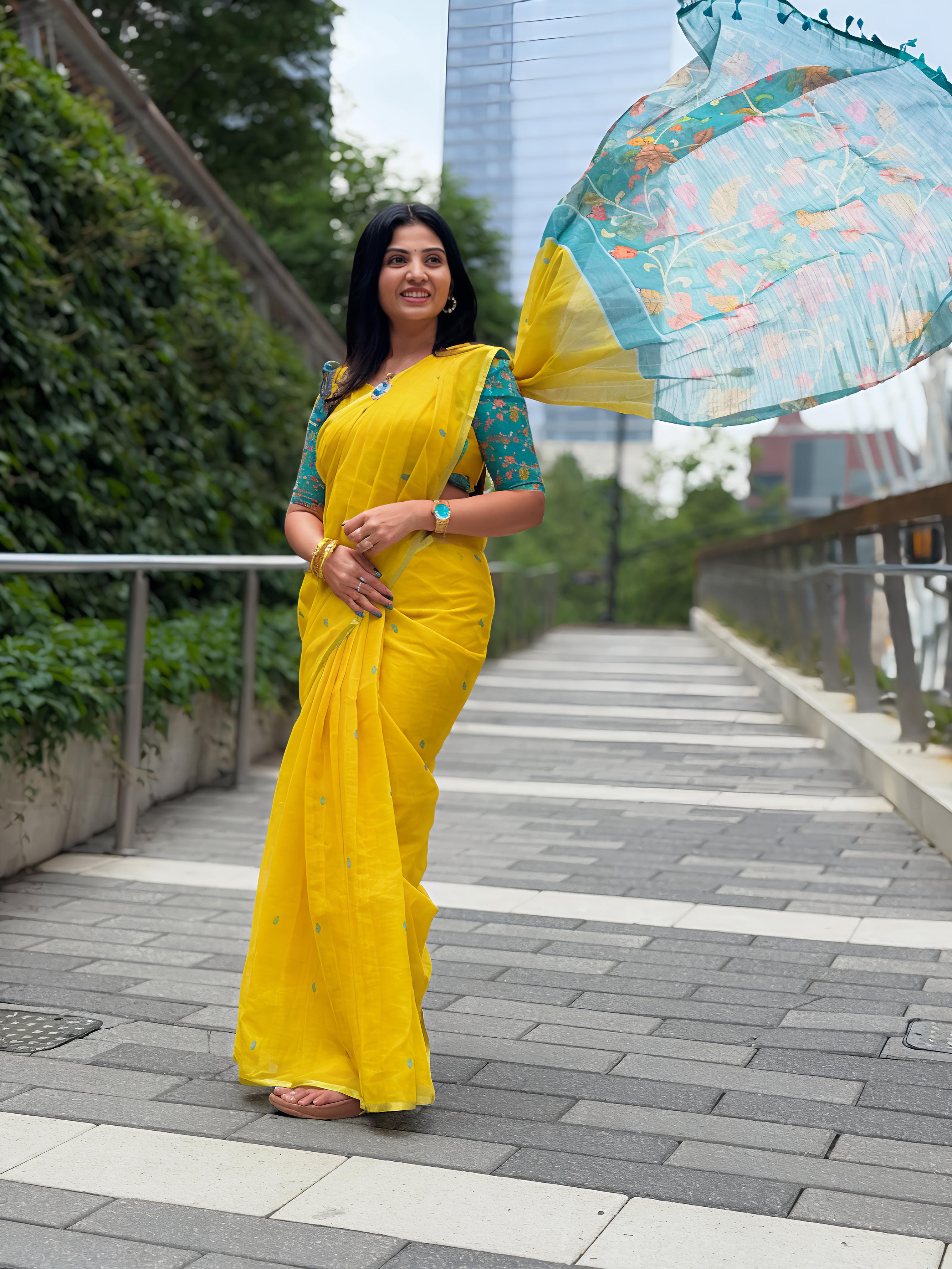 Sunny Yellow Handloom Linen Saree with Contrast Teal Floral Blouse
