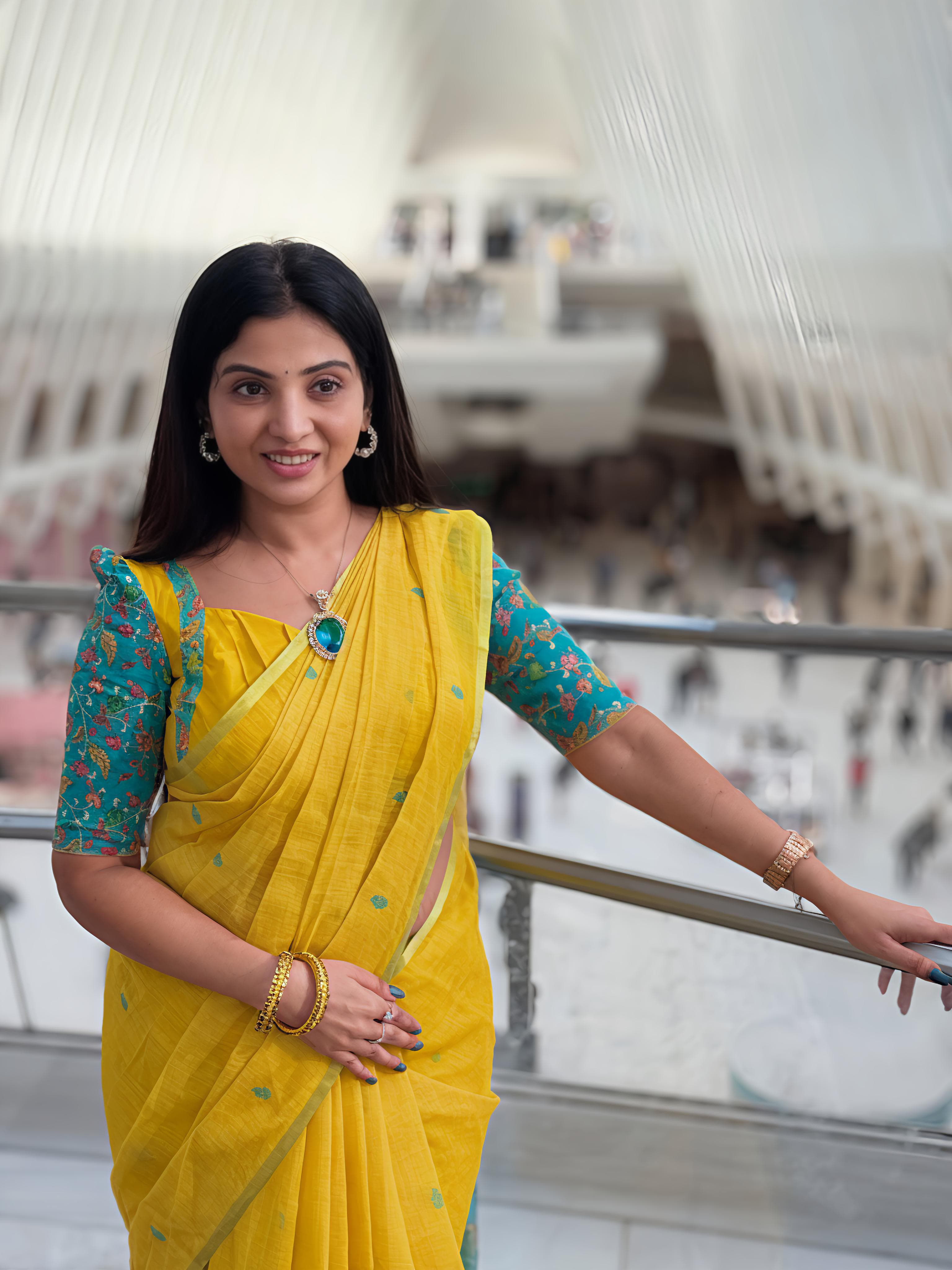 Sunny Yellow Handloom Linen Saree with Contrast Teal Floral Blouse