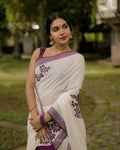 Elegant Handloom Linen Saree with Contrast Purple Border & Floral Prints
