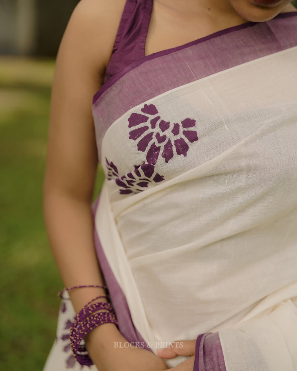 Elegant Handloom Linen Saree with Contrast Purple Border & Floral Prints