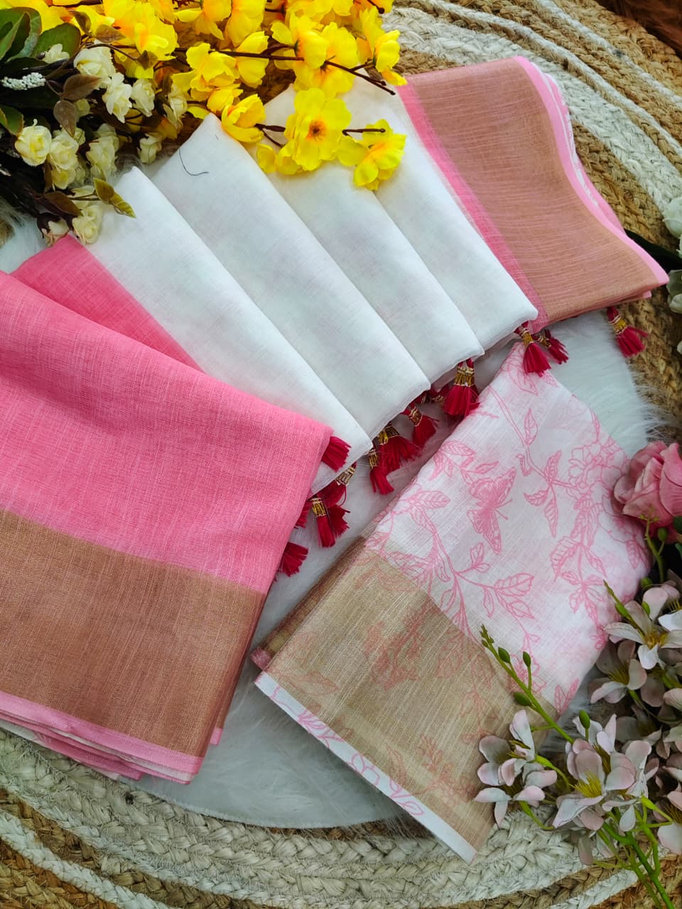 Classic White Linen Saree with Pink Border and Golden Zari Accent