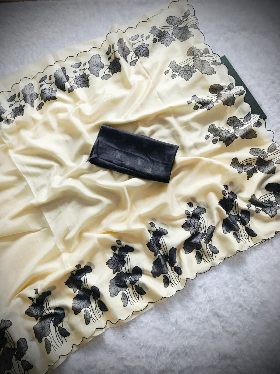 Pastel Yellow Saree with Black Floral Embroidered Border & Contrast Blouse