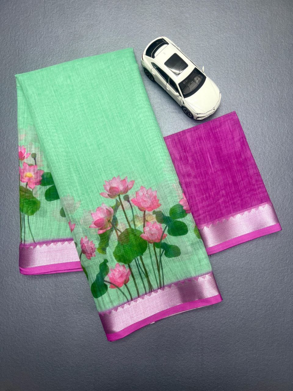 Floral Linen Saree in Mint Green with Pink Lotus Motifs