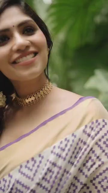 Elegant Cream Cotton Saree with Purple Geometric Print