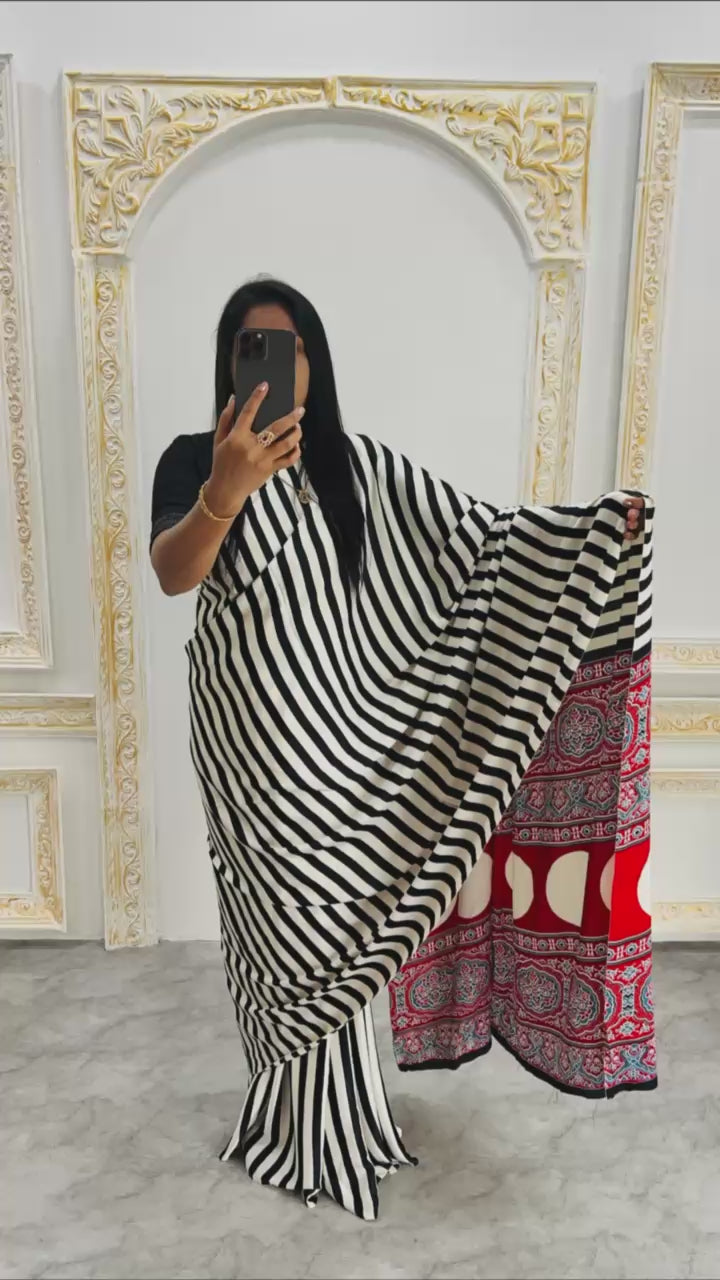Traditional Ajrakh Inspired  Pink & White Striped Saree with Bold Black Pallu